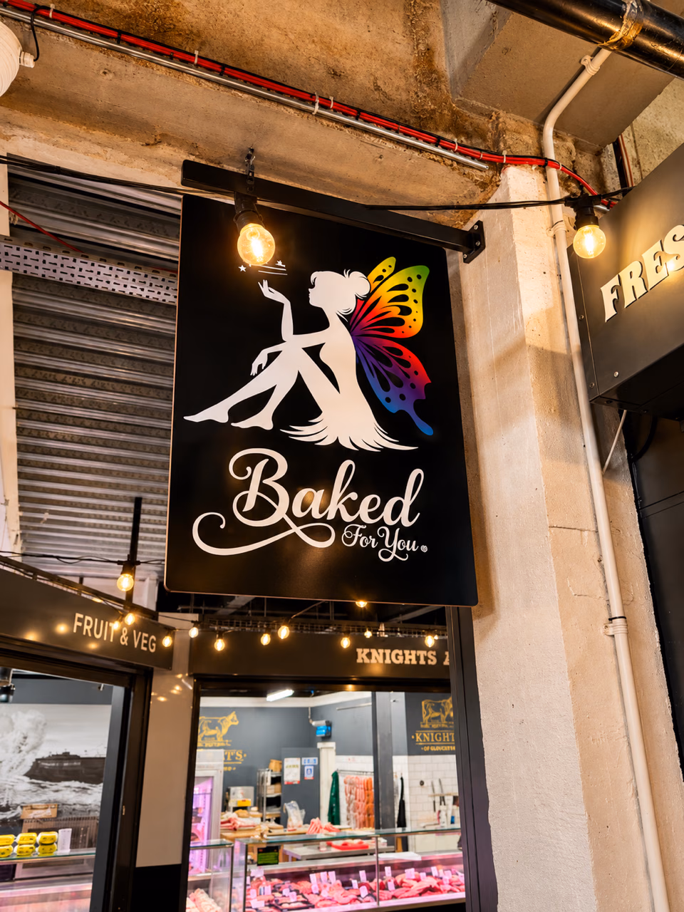 The Baked For You hanging shop sign at Five Valleys
